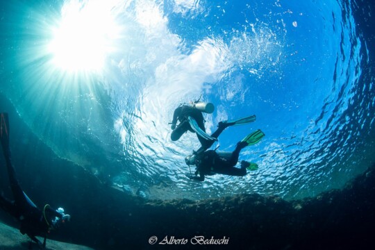 Divers Underwater in Dahab Diving