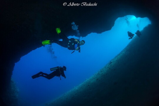 Divers Underwater in Dahab Diving